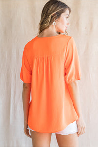 Neon orange solid top