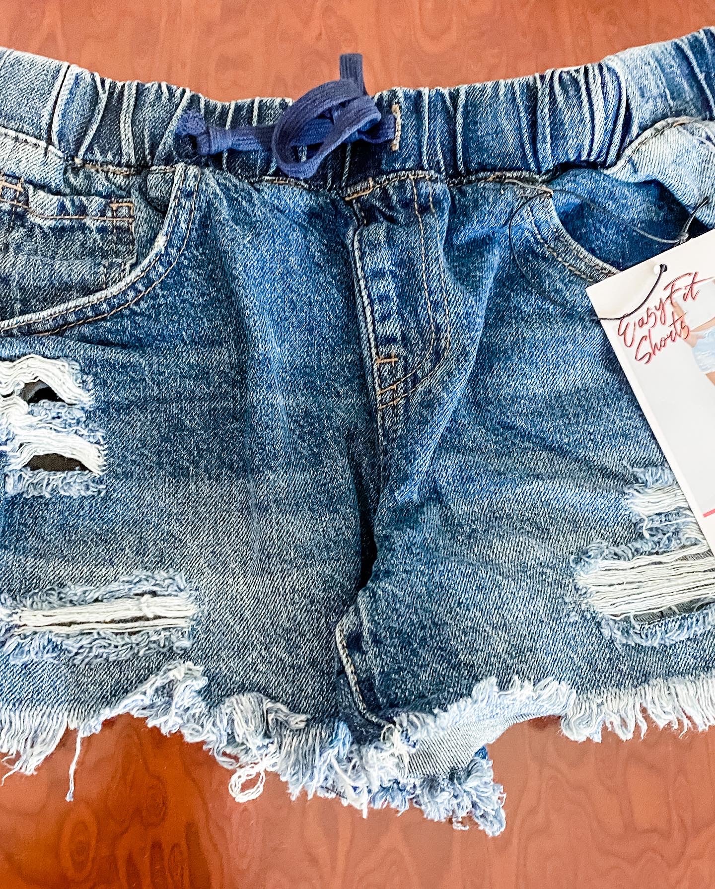 Elastic waist fashion ripped denim shorts